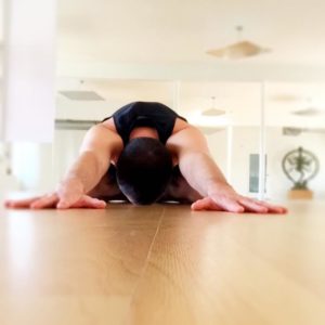yoga pose, reaching on floor